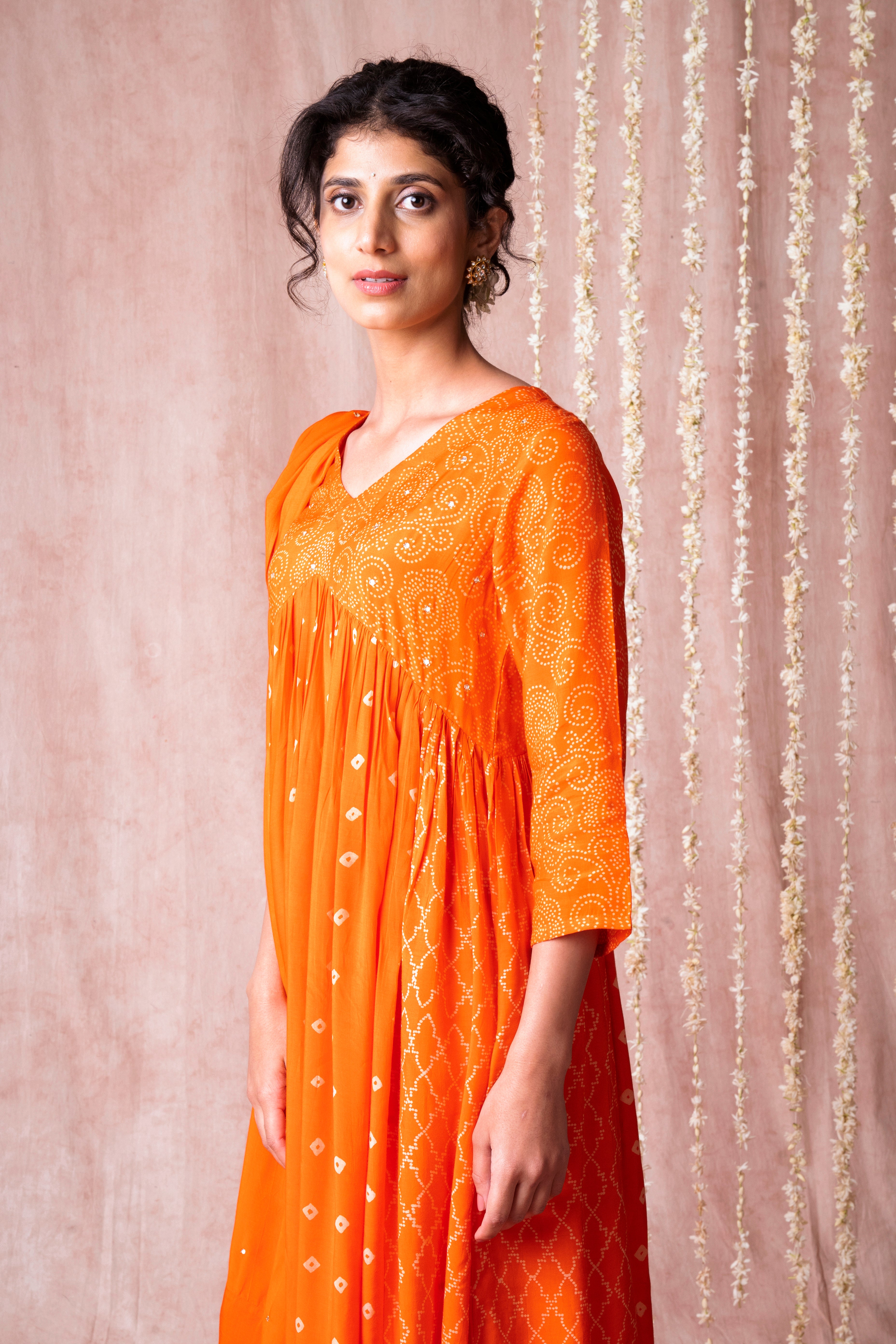 Bhargavi Orange Muslin Suit Set