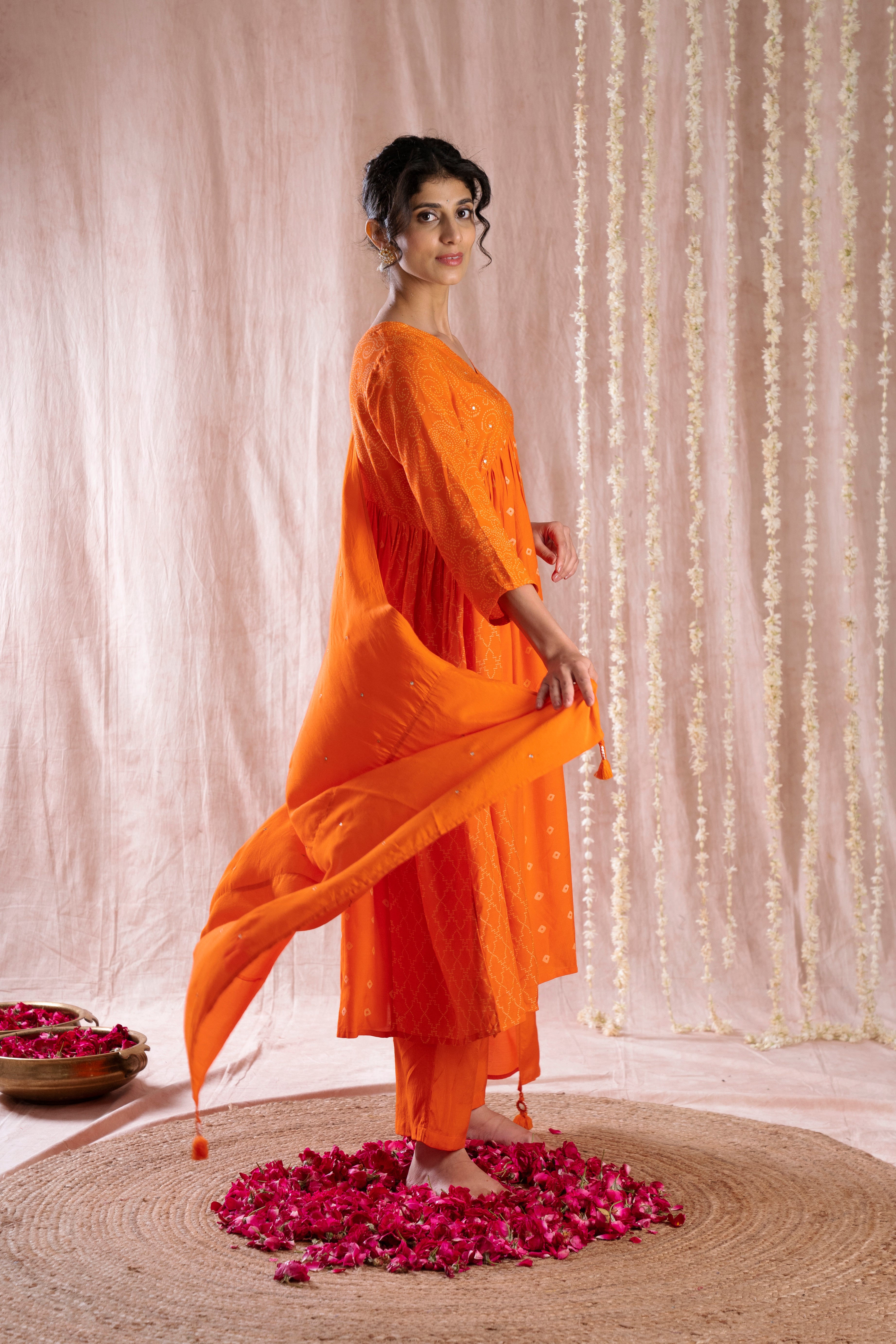 Bhargavi Orange Muslin Suit Set