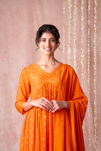 Bhargavi Orange Muslin Suit Set